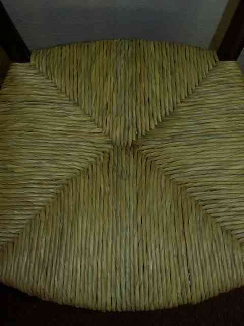 Hand-twisted cattail leaf rush seat.