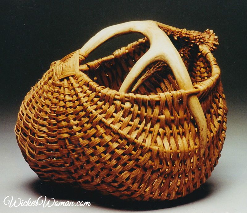 "First Attempt" was the first antler egg basket style designed and woven by Cathryn Peters in 1990.