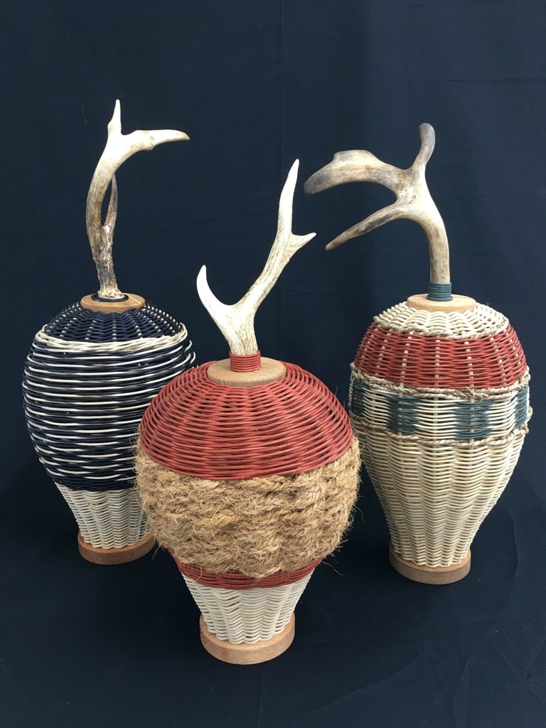 Sentinel Antler Basket Triad, three balloon shaped antler basket sculptures with three types of antlers, woven in a variety of colors and materials ©Cathryn Peters