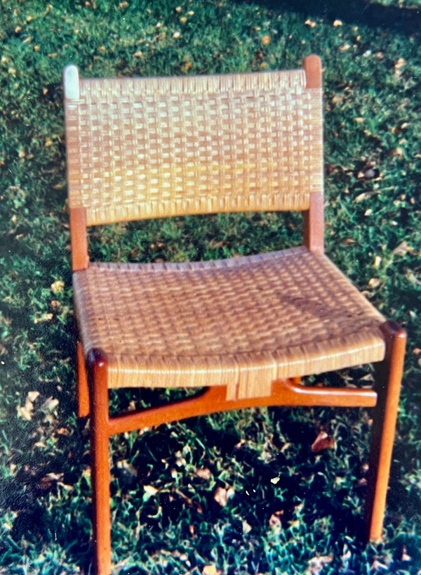 Danish Modern teak chair with cane seat and back.