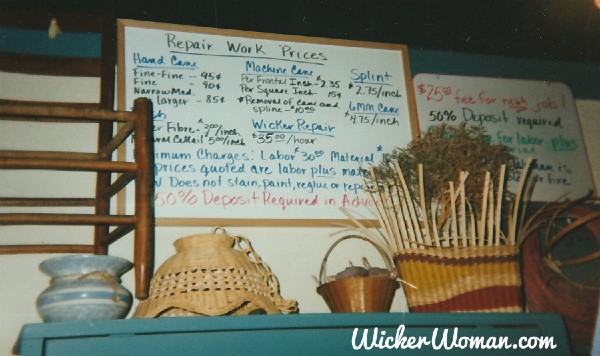 Chair caning repair charges and price sign at The Wicker Woman shop in 1995. 