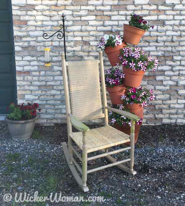 Porch cane rocker with New England style, wide binding cane seat and back.